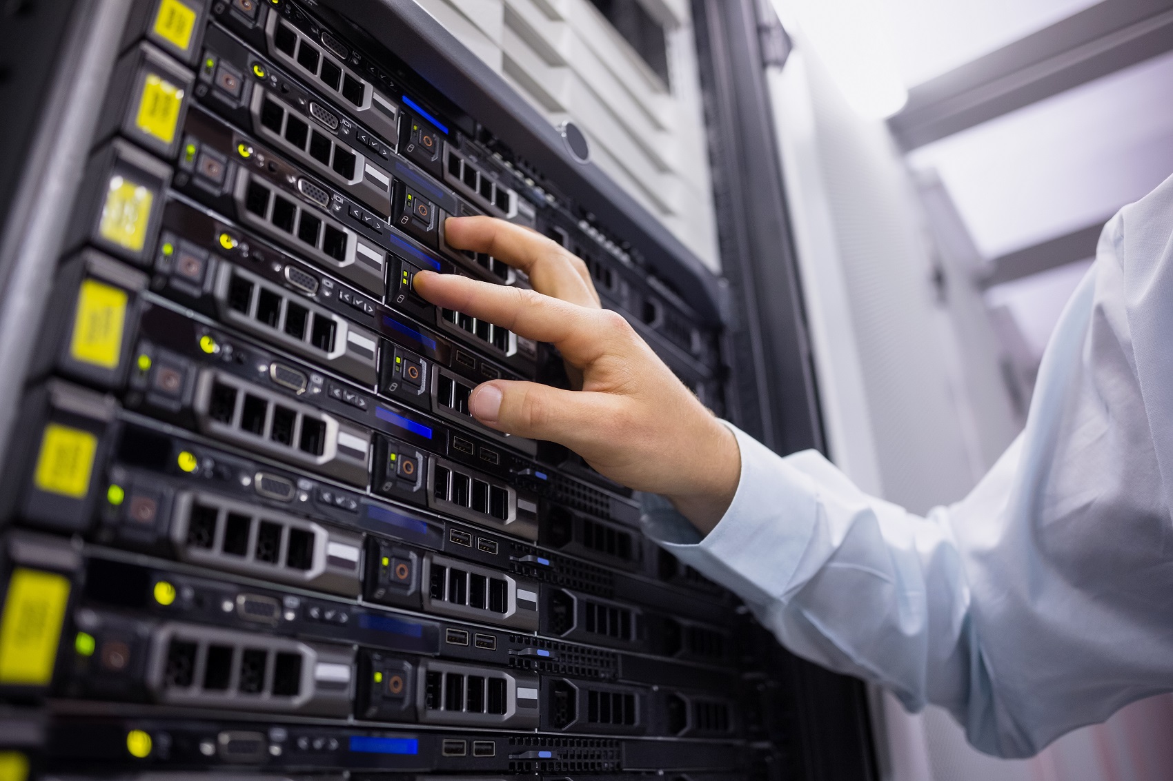 Technician working on server tower